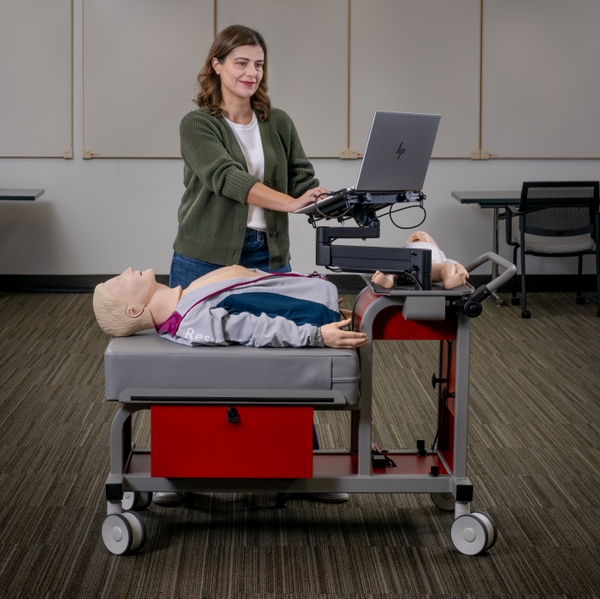 Woman+uses+a+CPR+Verification+Station