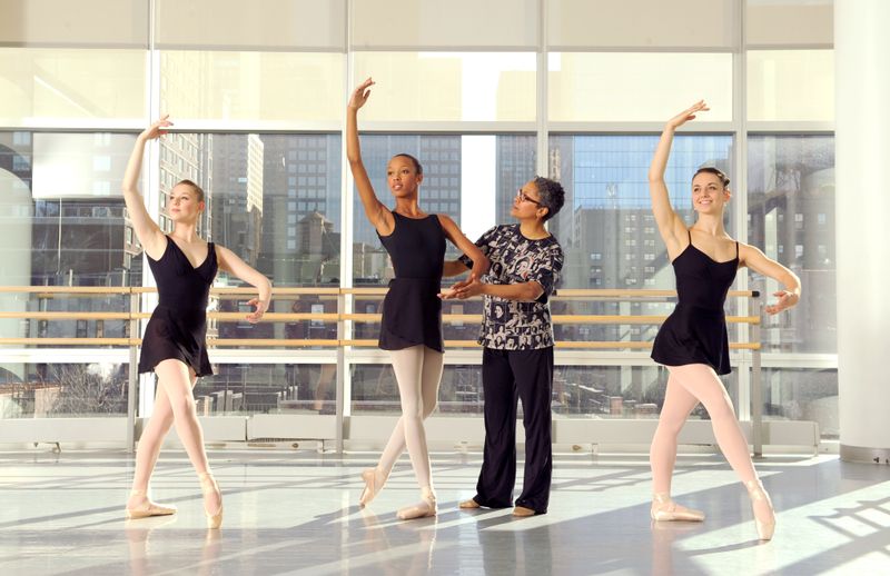 Ailey School co-director Melanie Person with students from the Professional Division