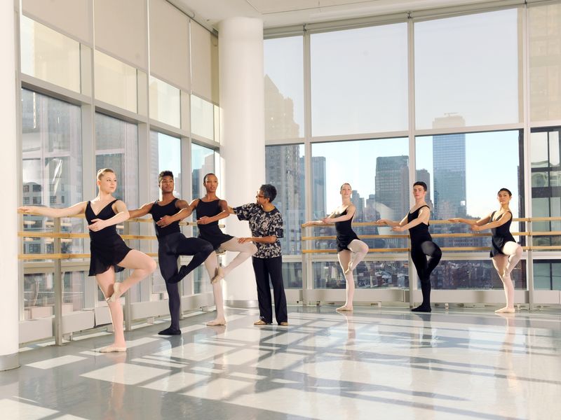 Ailey School co-director Melanie Person with students from the Professional Division