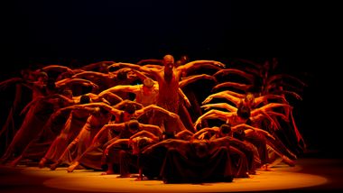 Alvin Ailey American Dance Theater in Alvin Ailey's Revelations with cast of 50