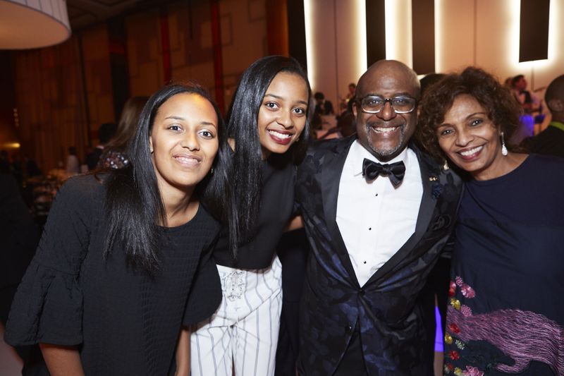 Marc and Almaz Strachan with daughters