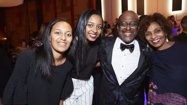 Marc and Almaz Strachan with daughters