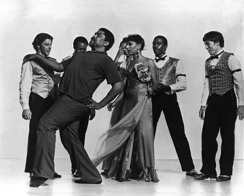 Alvin Ailey (front left) with company members including  Masazumi Chaya (far right) during a rehearsal of Donald McKayle's District Storyville. Photo by Jack Mitchell. (©) Alvin Ailey Dance Foundation, Inc. and Smithsonian Institution