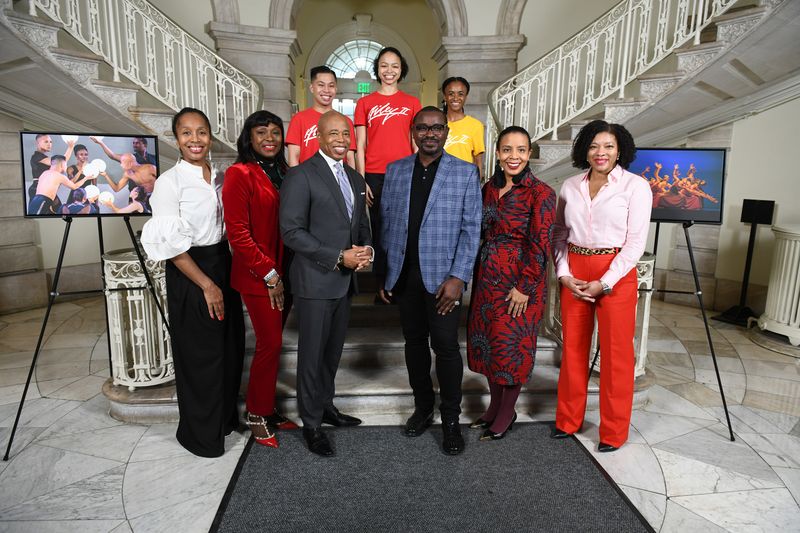 Francesca Harper, Mayor Adams, Robert Battle and Laurie Cumbo with Ailey II dancers in City Hall for the announcement of the AileyMovesNYC! photography installation