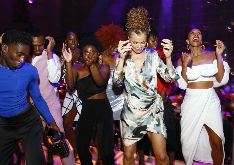 Alvin Ailey American Dance Theater and Honorary Chair Andra Day dancing at the 2023 Ailey Spirit Gala