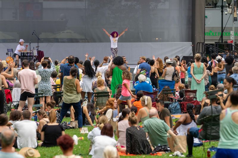 Ailey Extension's Katherine Jimenez leading NY Style Mambo in Bryant Park Ailey Moves NYC 2022. Photo by Rob DeMartin
