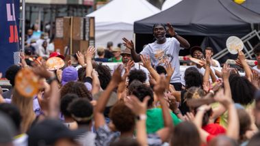 Ailey Extension's Maguette Camara leading West African in Times Square, Ailey Moves NYC 2022
