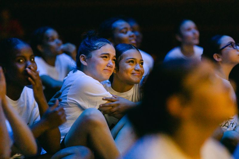 AileyCamp Newark participants watching a reflections video during the 2023 final performance