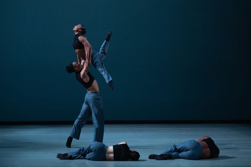 Ailey II's Carley Cruzat Brooks and Xhosa Scott and company in Houston Thomas' Down the Rabbit Hole. Photo by Nir Arieli