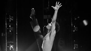 Alvin Ailey American Dance Theater's Mason Evans in Alvin Ailey's Revelations. Photo by Xavier Mack