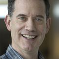 Close-in headshot of Tom Scanlan, Ph.D., a smiling white adult.