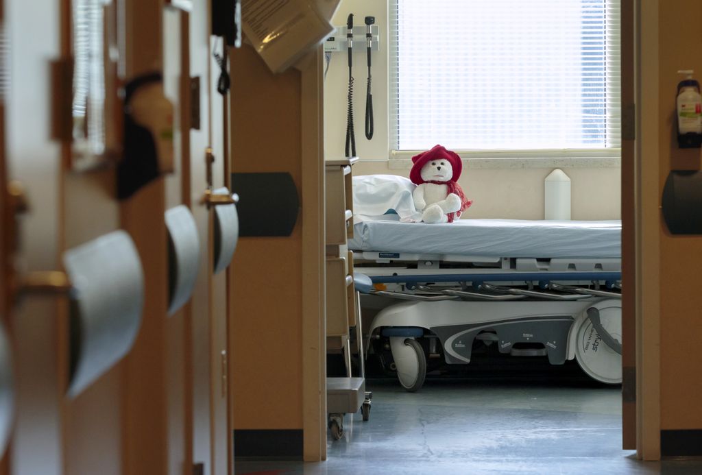 Teddy bear on bed