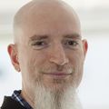 bald headed man, with long white beard