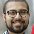 young man, dark beard, glasses