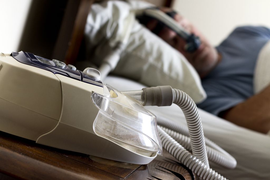 Person sleeping with mask