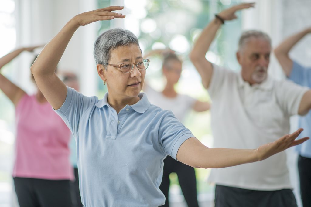 group of seniors doing tai-chi