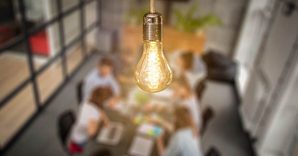 Young creative business people meeting at office. With the agreement clarifying ownership of intellectual property created by the participating universities in advance, it avoids potential sticking points later. (Getty Images)