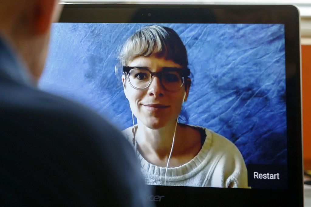 woman chatting with man via video 