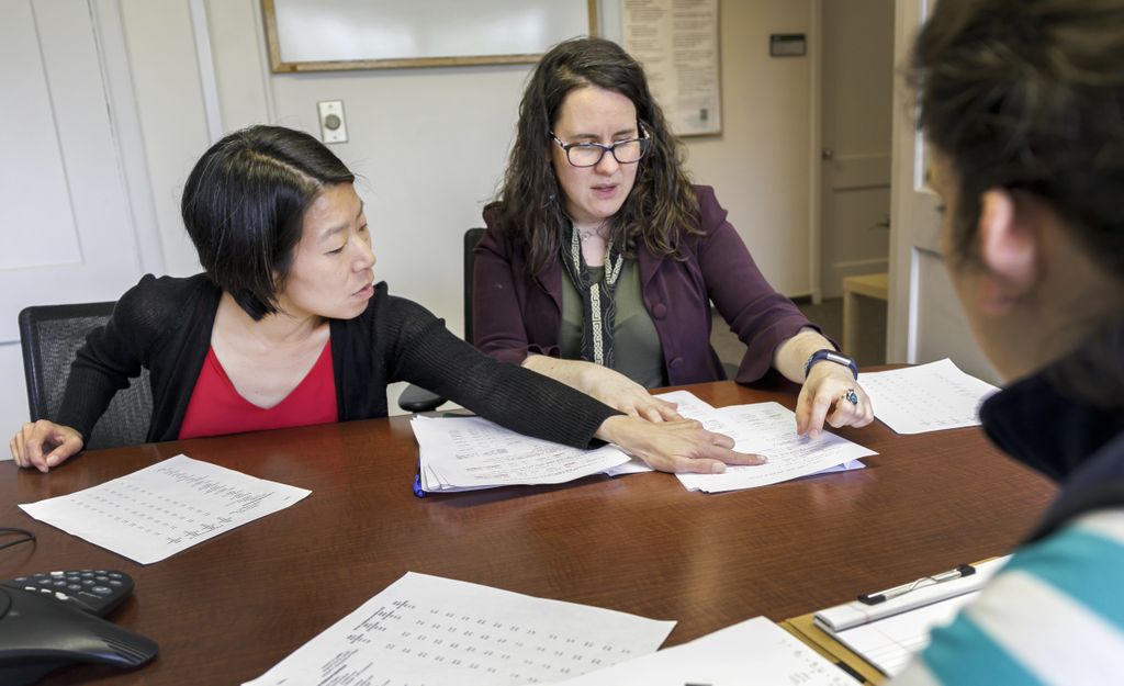 Janne Boone-Heinonen, Ph.D. and jennifer seamans looking over paperwork