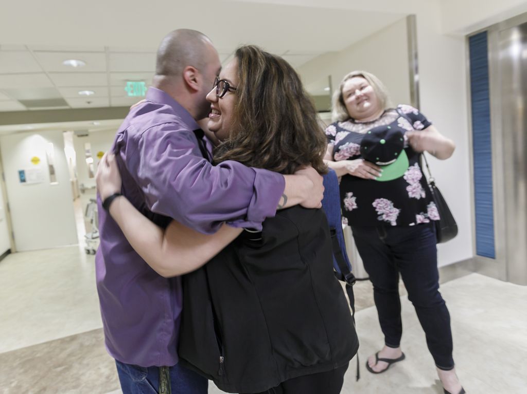 Jesus and Dr. Nonas hugging