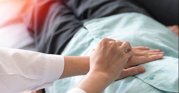 Patient with doctor checking on stomach diseases or gastropathy include gastritis, gastroparesis, diarrhea on senior old female person in hospital.