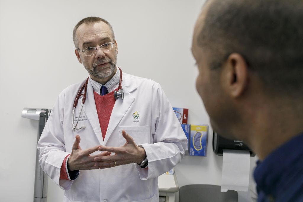 Beer, talking with a patient