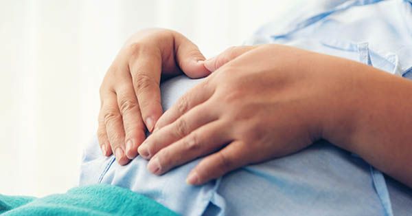 Pregnant woman lying on the bed waiting to give birth in a hospital. New findings show that patient questionnaires are not effective in identifying lead risk for children and pregnant women. (Getty Images)