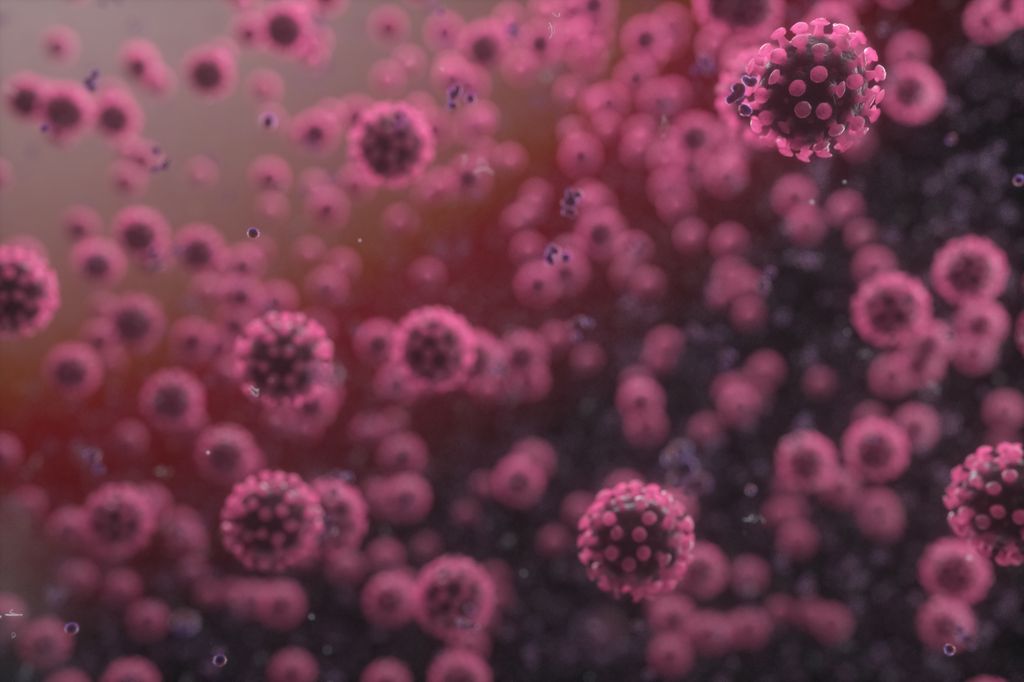 an illustration of coronavirus floating across a red background