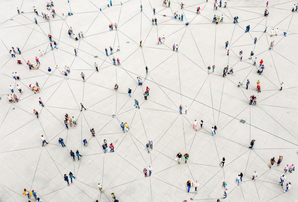 birdseye view of people walking and an overlay of lines connecting them