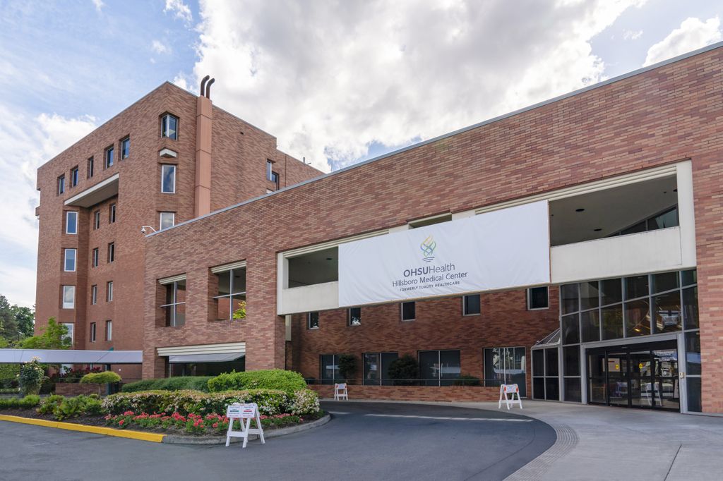 outside photo of a brick building with a NICU sign on the front