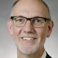 Jim Anderson, M.D. (OHSU) with a gray background.