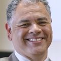 Image of Derick Du Vivier at OHSU. A man with gray hair smiling.