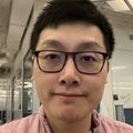 Closeup headshot of (Samuel) Yiu Huen Tsang, Ph.D., an Asian man in glasses and a button-down shirt.