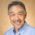 Close-in headshot of Scott Wong Ph.D., a smiling Asian man with greying hair and a moustache
