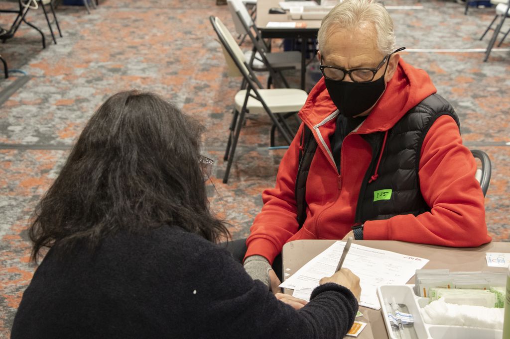 Seniors receive COVID vaccinations