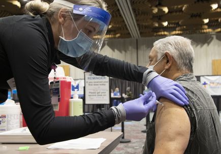 Seniors receive COVID vaccinations