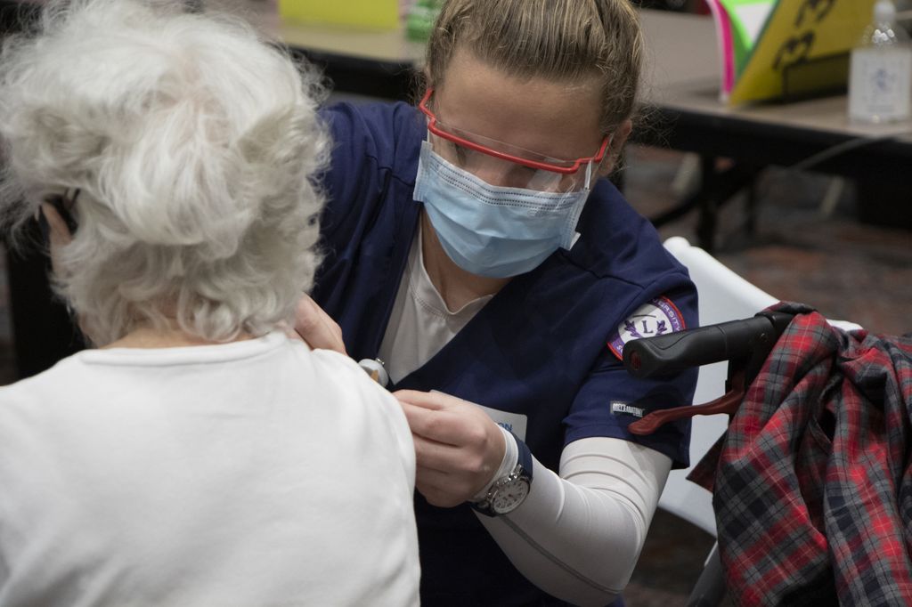 Seniors receive COVID vaccinations