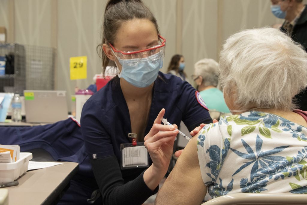 Seniors receive COVID vaccinations