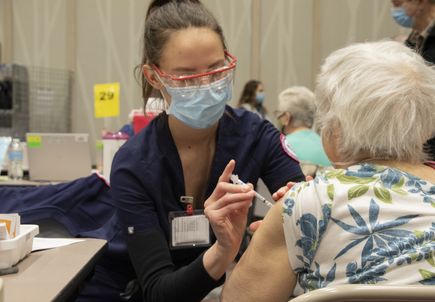 Seniors receive COVID vaccinations