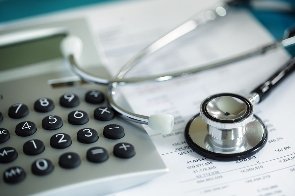 Massive cost for Acthar meager benefit. Image of a calculator, a medical bill, and a stethoscope. 