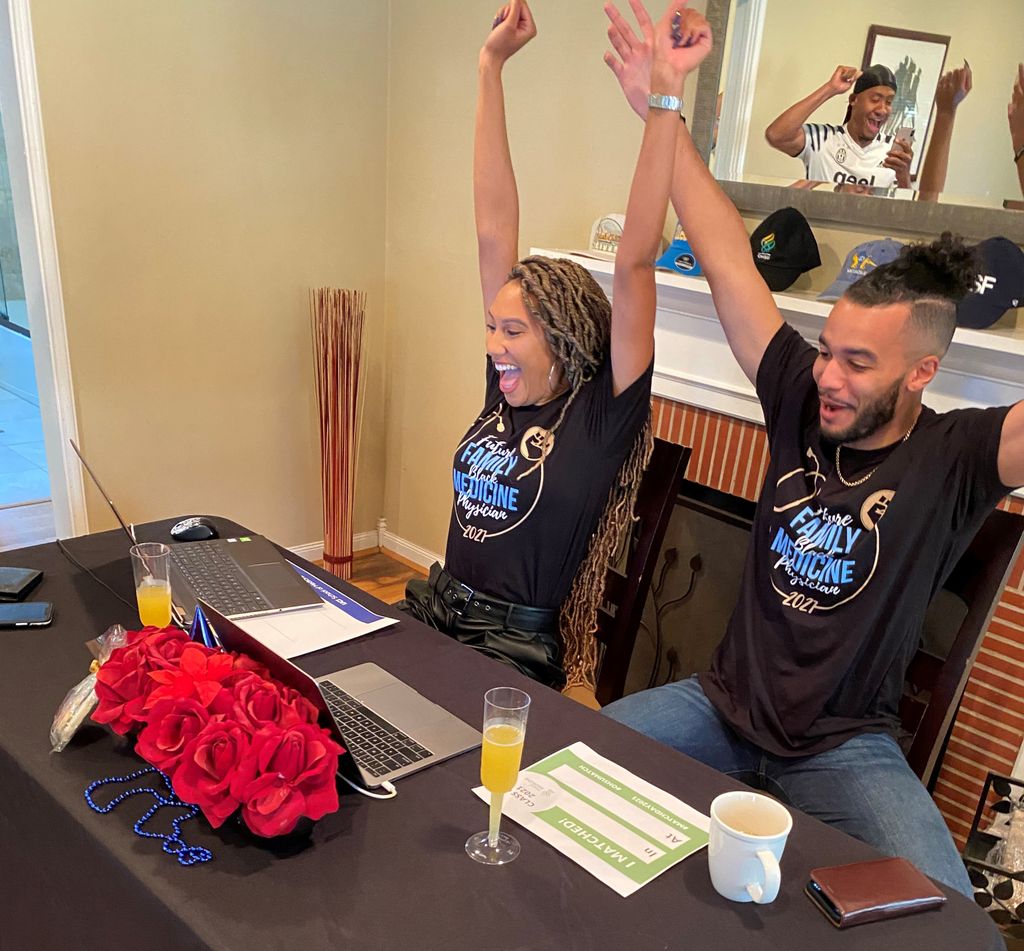 Two medical students who are partners pump their fists in celebration as they learn that they matched together to the Family Medicine residency at UCSF.