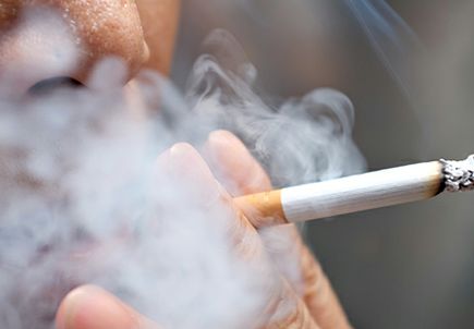 Smoking a cigarette