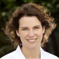 Marian Dale, M.D., M.C.R. (OHSU) among trees at OHSU.