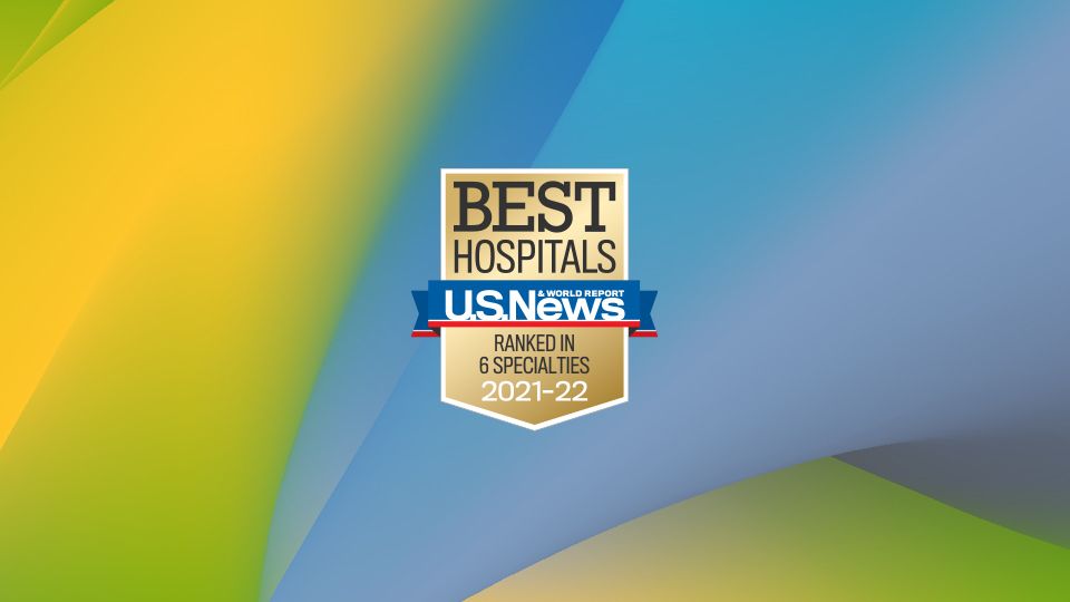 USNWR adult rankings badge with OHSU's signature colors (yellow, green, blue and charcoal) in an abstract design in the background.