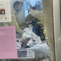 COVID-19 patient being turned