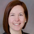 Katie Drago, M.D., next to a brown background.