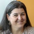 Amy Penkin, M.S.W., LCSW (OHSU) A person with long black/gray hair, smiling.