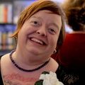 Kelly Jeske, LCSW (Courtesy of Jeske); a person with short red hair, smiling.
