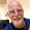 Dana A. Braner M.D.  holding a dog (OHSU)