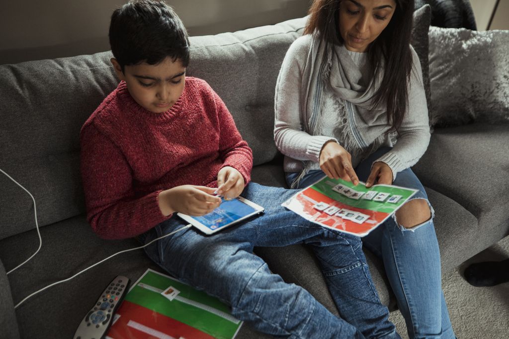 Early childhood communication teacher with a child. OHSU researchers are looking to improve health disparities in autism care and other early childhood communication disorders. (Getty Images)